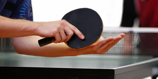 谈求吧打乒乓球图片